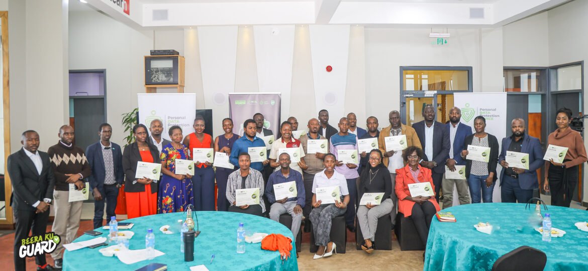 Representatives of professional associations hold up their certificates after the conference.